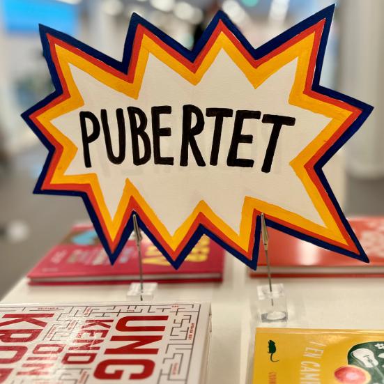 Skilt til udstilling om pubertet