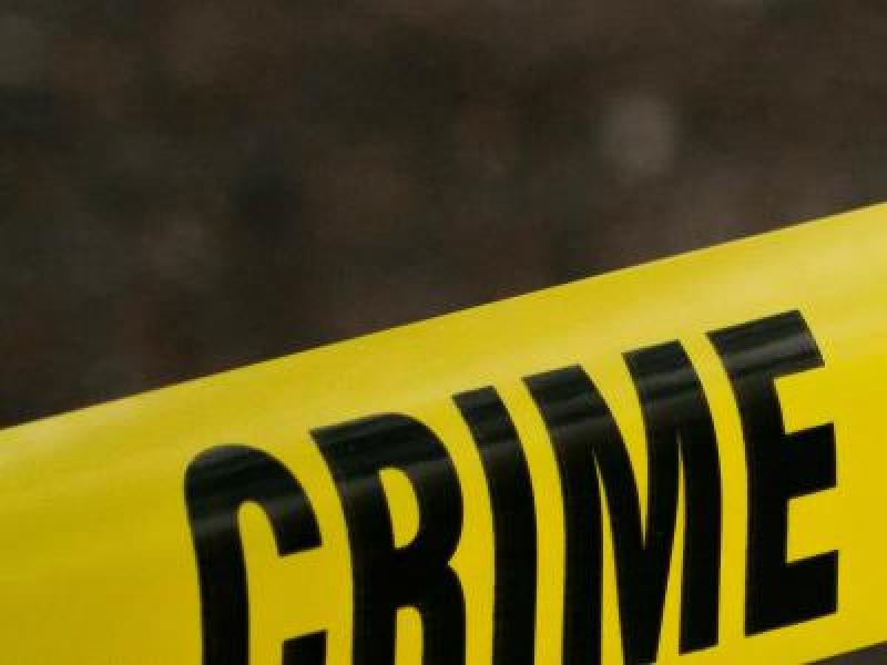 Billede af afspærringsbånd ved et åsted